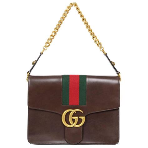 gucci sold at gucci outlets fake|Gucci knockoff sites.